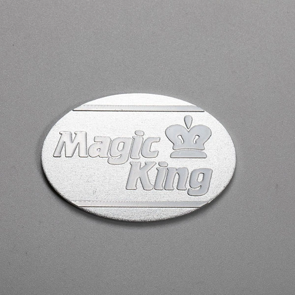 Etiqueta engomada del metal del logotipo