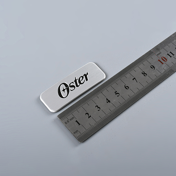 Logo grabado metal Tags
