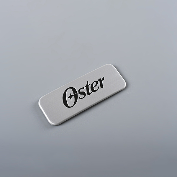 Logo grabado metal Tags