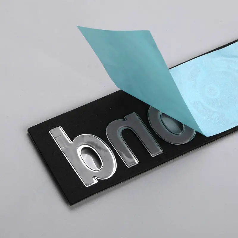 Emblema de plástico ABS.