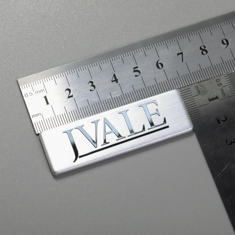 Adhesivos con logotipo de marca de aluminio para equipos