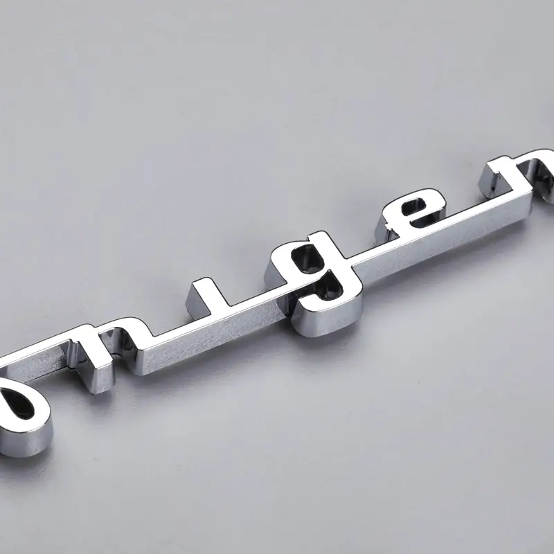 Emblema autoadhesivo.